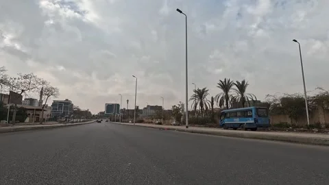 Vehicle Passing Through Clean Urban Roads New Cairo Showing Buildings Traffic Stock Footage 330106461