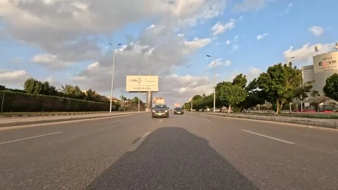 Vehicle Passing Through Dynamic City Roads New Cairo Showing Buildings Traffic Video stock 329662237