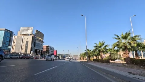 Vehicle Passing Through Elegant Modern City Streets New Cairo Showing Buildings Stock Footage 329674121