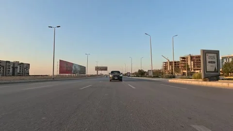 Vehicle Passing Through Newly Planned District New Cairo Showing Buildings Stock Footage 329788754