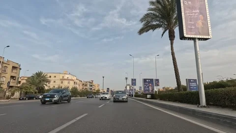 Vehicle Passing Through Peaceful City Roads New Cairo Showing Buildings Traffic Stock Footage 329764580