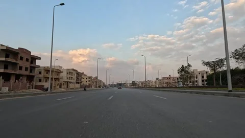 Vehicle Passing Through Spacious Residential Streets New Cairo Showing Buildings Stock Footage 329895916