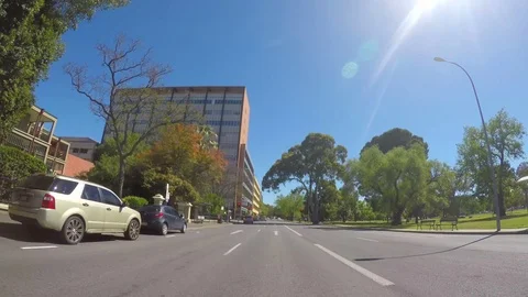 Vehicle POV, driving along Sir Edwin Smith Avenue past the Memorial Hospital Stock Footage