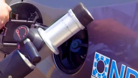 A vehicle is powered and refueled by renewable hydrogen at a futuristic filling Video stock 74797341