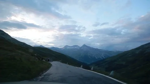 Vehicle shoot. The mountain road, the border of Italy and Switzerland Stock Footage 73377463