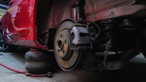 Vehicle structure, car view from below, repair, garage, car disassembly into Stock Footage 113109955