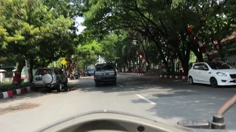 Vehicle traffic on a city road in Java, Indonesia. Stock Footage 160481229
