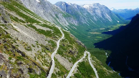Vehicle on Trollstigen or Trolls Path, a popular serpentine mountain road. Stock Footage 118158632