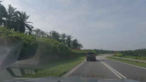 Vehicle was moving behind the pickup truck on a curved road Stock Footage 314060437