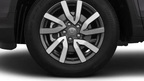 Vehicle wheel close up side view Modern Steel Metallic 2021 Honda Pilot EX-L Video stock 159592907