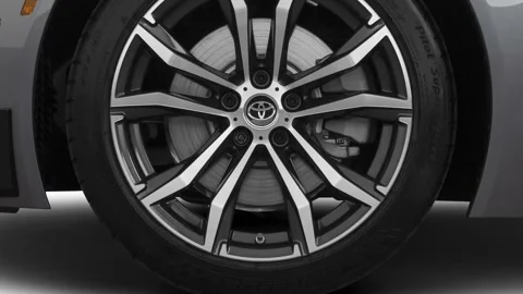 Vehicle wheel close up side view Turbulence Gray 2021 Toyota GR Supra 2.0 Stock Footage 159593147