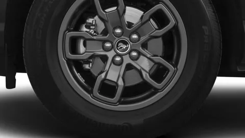 Vehicle wheel close up side view Iconic Silver 2021 Ford Bronco Sport Big Bend Stock Footage 159593525