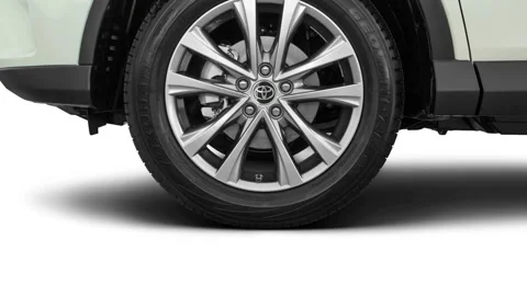 Vehicle wheel close up side view Blizzard Pearl 2016 Toyota RAV4 Limited Stock Footage 159881769