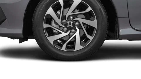 Vehicle wheel close up side view Modern Steel Metallic 2016 Honda Civic LX-P Video stock 159888831