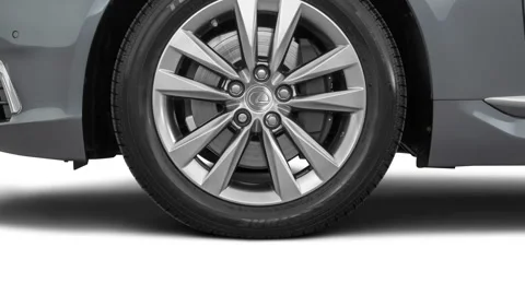 Vehicle wheel close up side view in studio Nebula Gray Pearl 2016 Lexus LS LS460 Stock Footage 159894092