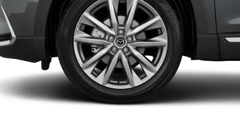 Vehicle wheel close up side view Machine Gray Metallic 2016 Mazda CX-9 Signature Stock Footage 159897599