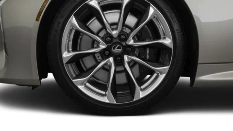 Vehicle wheel close up side view in studio Atomic Silver 2018 Lexus LC LC 500 Stock Footage 159968082