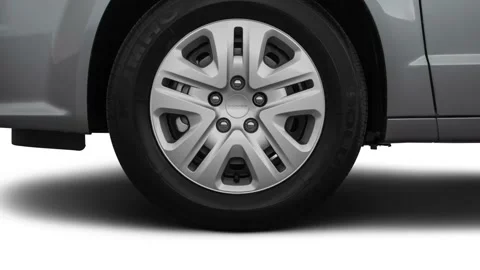 Vehicle wheel close up side view Billet Clear Coat 2018 Dodge Grand Caravan SE Stock Footage 159988940
