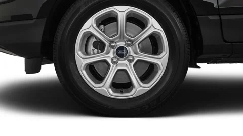 Vehicle wheel close up side view in studio Shadow Black 2018 Ford EcoSport SE Stock Footage 159993457