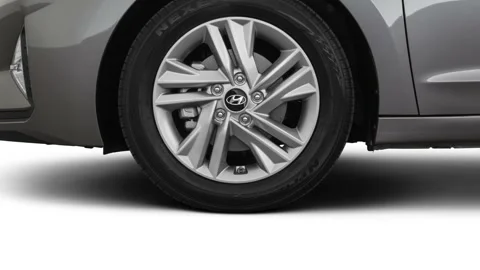 Vehicle wheel close up side view Machine Gray Metallic 2019 Hyundai Elantra SEL Stock Footage 160041288