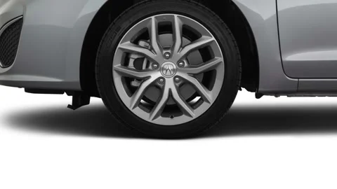 Vehicle wheel close up side view Lunar Silver Metallic 2019 Acura ILX LS Stock Footage 160043562