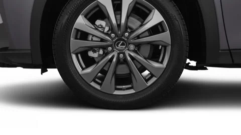 Vehicle wheel close up side view Nebula Gray Pearl 2019 Lexus UX UX 200 F Sport Stock Footage 160050975