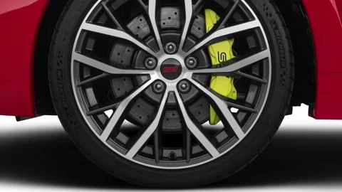 Vehicle wheel close up side view in studio Pure Red 2020 Subaru WRX STI Stock Footage 160081219