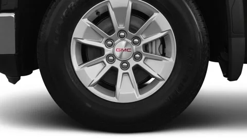 Vehicle wheel close up side view in studio Onyx Black 2019 GMC Sierra 1500 SLE Stock Footage 160081648
