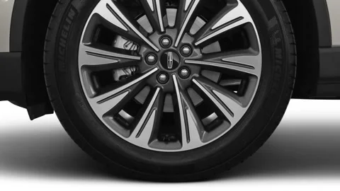Vehicle wheel close up side view Magnetic Gray 2020 Lincoln Corsair Reserve Video stock 160094552