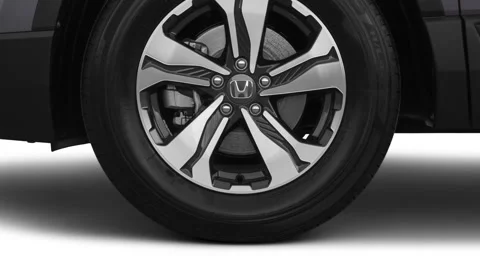 Vehicle wheel close up side view Slate Green Metallic 2020 Honda CR-V LX CUV Video stock 160102684