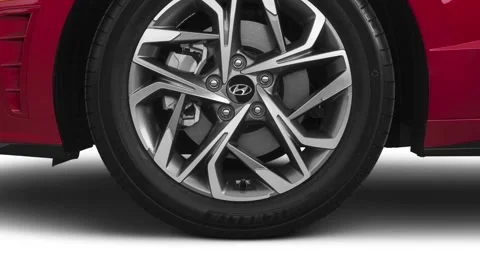Vehicle wheel close up side view Shimmering Silver 2020 Hyundai Sonata SEL sedan Stock Footage 160103374