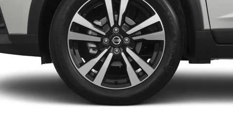 Vehicle wheel close up side view Brilliant Aluminum 2020 Nissan Kicks SV CUV Stock Footage 160104737