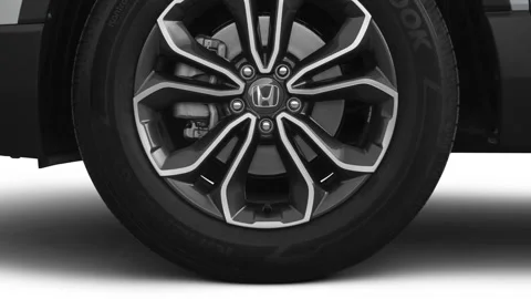 Vehicle wheel close up side view Lunar Silver Metallic 2020 Honda CR-V EX Stock Footage 160112965