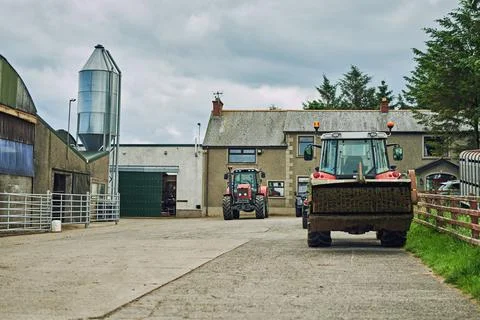 Vehicles for all your agricultural needs. agricultural vehicles on a dairy farm. Stock Photos