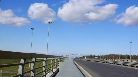 Vehicles approaching the bridge moving on the highway Stock Footage 58899679