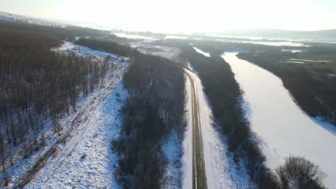Vehicles are driving on the road in cold weather Stock Footage 301600853