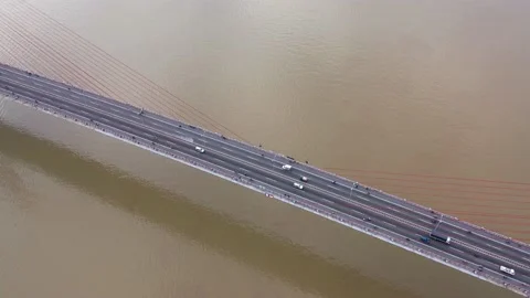 Vehicles are moving on the longest cable-stayed bridge in Vietnam Stock Footage 167053062