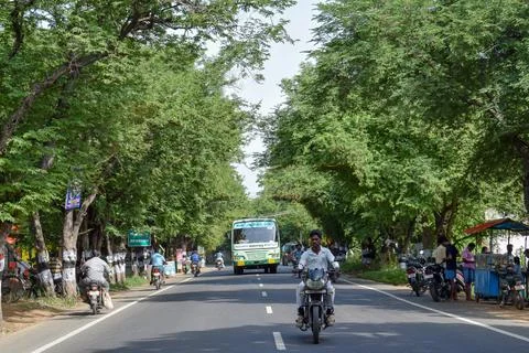 The vehicles are passing . Stock Photos