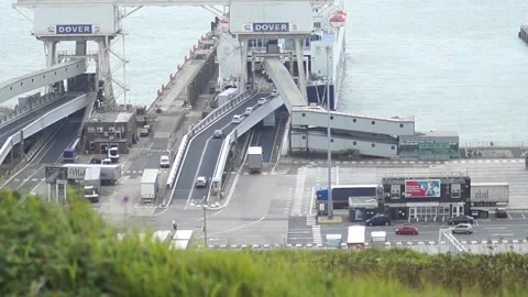 Vehicles being loaded onto a ferry a Dover Video stock 247509110