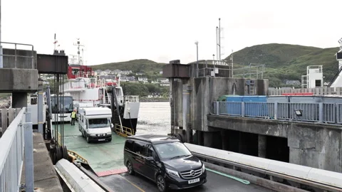 Vehicles Depart Passenger Ferry at Mallaig Harbour Stock Footage 317161353