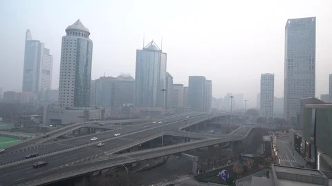 Vehicles drive on the Guomao Bridge amid new coronavirus outbreak in Beijing Stock Footage 123760308