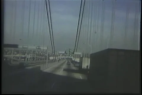 Vehicles drive on Throg's Neck Bridge - 1970 Stock Footage 99784988