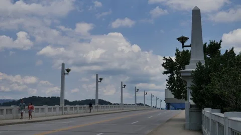 Vehicles driving on a bridge Stock Footage 76506861