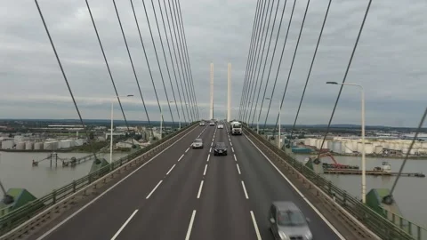 Vehicles driving on cable-stayed bridge above Thames river Stock-Footage 161121085