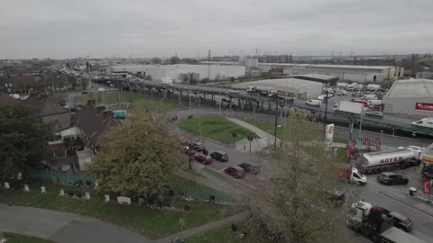 Vehicles driving on elevated trunk road in suburb Stock-Footage 167929878