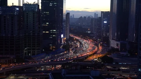 Vehicles driving on a main road during the evening rush hour in Shenzhen Stock Footage 95545452