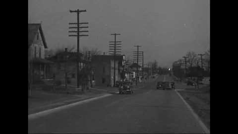 Vehicles driving on road - 1939 Stock Footage 103597060