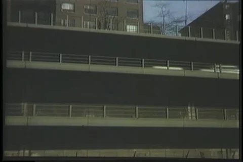Vehicles driving on the stack highway in New York city - 1970 Stock Footage 99785042