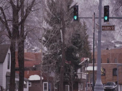 Vehicles driving on street during snowfall 動画素材 84505259