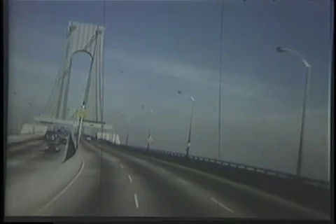 Vehicles driving on Throg's Neck Bridge - 1970 Stock Footage 99784982